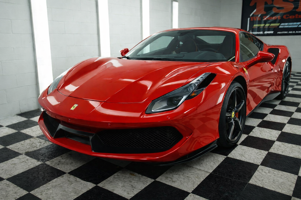 Red Ferrari receiving ceramic coating service for prestige cars in Rockhampton